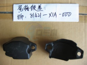 Product image: Sym - 81421-X1A-000 - TRUNK BOX  LOCK COVER 