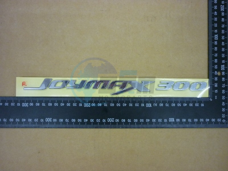 Product image: Sym - 87126-L3C-000 - R. BODY COVER EMBLEM 'JOYMAX 300'  0