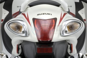 Product image: Suzuki - 99000-99013-K15 - TAIL LIGHT COVER SET CHROME 