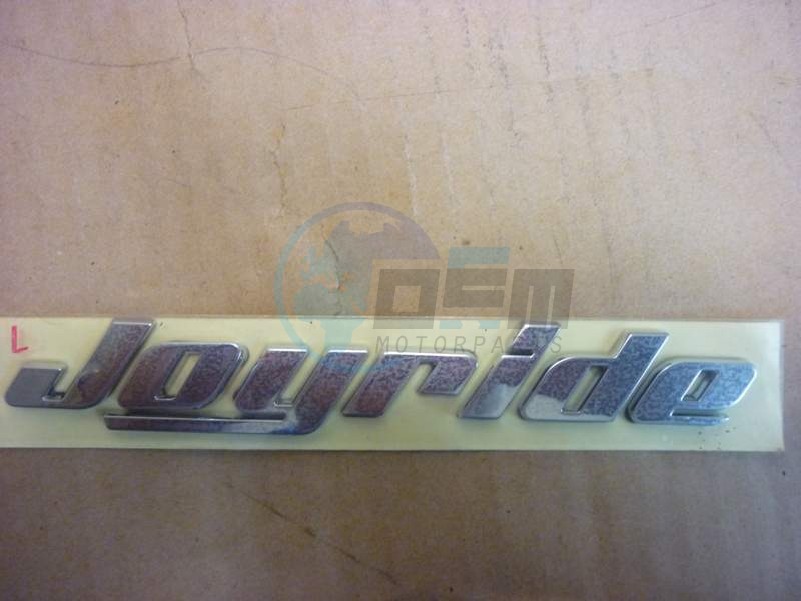 Product image: Sym - 87127-LWB-000 - L. BODY COVER EMBLEM TYPE1  0