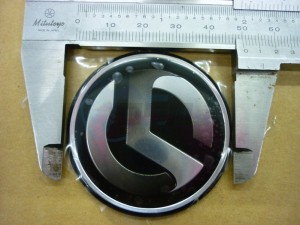 Product image: Sym - 87123-HWF-000 - S-LOGO 50MM(PU-AL) 